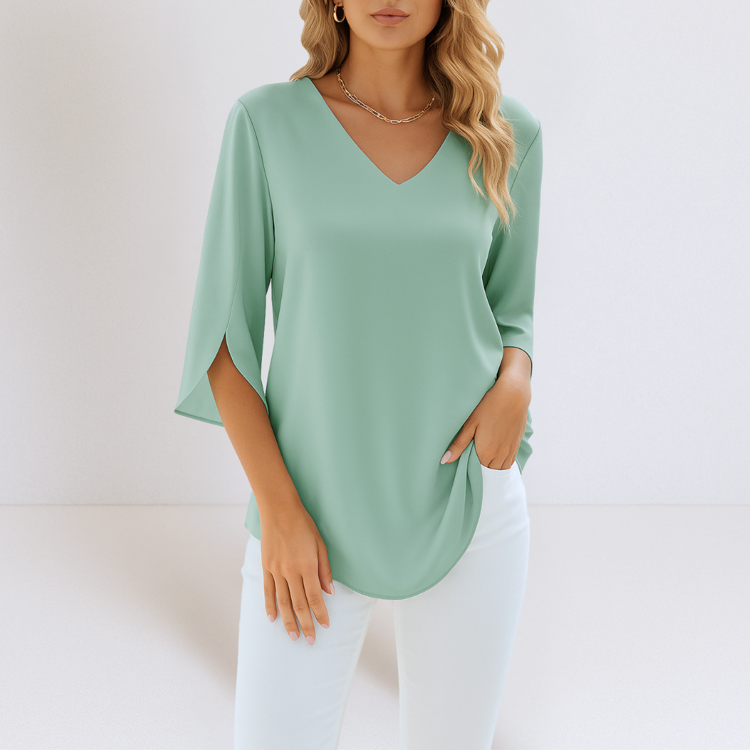 Valorine™ - Elegant blus med V-ringning och slitsade ärmar